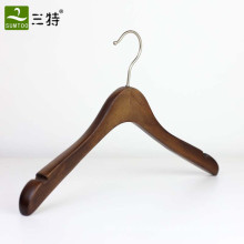 women clothes store wooden clothes hangers